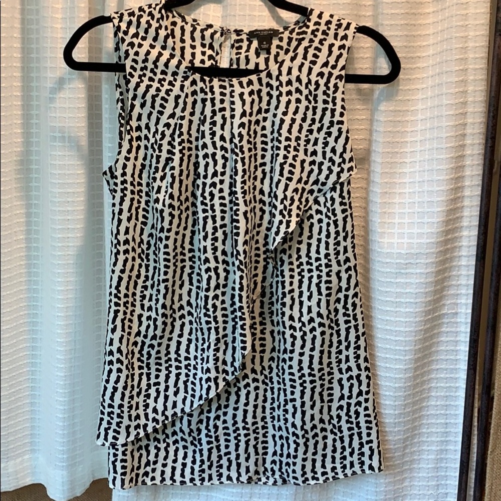 Black & white animal print sleeveless blouse
